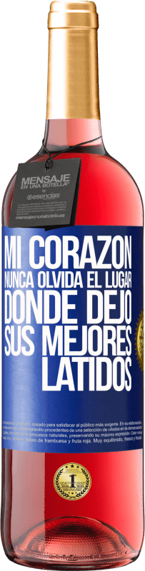 29,95 € Envío gratis | Vino Rosado Edición ROSÉ Mi corazón nunca olvida el lugar donde dejó sus mejores latidos Etiqueta Azul. Etiqueta personalizable Vino joven Cosecha 2023 Tempranillo