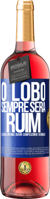 29,95 € Envio grátis | Vinho rosé Edição ROSÉ O lobo sempre será ruim se você apenas ouvir Chapeuzinho Vermelho Etiqueta Azul. Etiqueta personalizável Vinho jovem Colheita 2024 Tempranillo