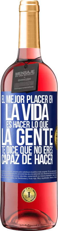 29,95 € Envío gratis | Vino Rosado Edición ROSÉ El mejor placer en la vida es hacer lo que la gente te dice que no eres capaz de hacer Etiqueta Azul. Etiqueta personalizable Vino joven Cosecha 2024 Tempranillo