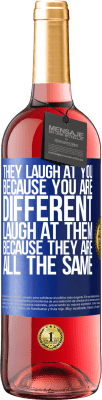 29,95 € Free Shipping | Rosé Wine ROSÉ Edition They laugh at you because you are different. Laugh at them, because they are all the same Blue Label. Customizable label Young wine Harvest 2023 Tempranillo