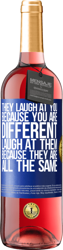 29,95 € Free Shipping | Rosé Wine ROSÉ Edition They laugh at you because you are different. Laugh at them, because they are all the same Blue Label. Customizable label Young wine Harvest 2024 Tempranillo