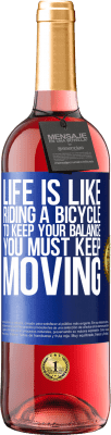 29,95 € Free Shipping | Rosé Wine ROSÉ Edition Life is like riding a bicycle. To keep your balance you must keep moving Blue Label. Customizable label Young wine Harvest 2024 Tempranillo