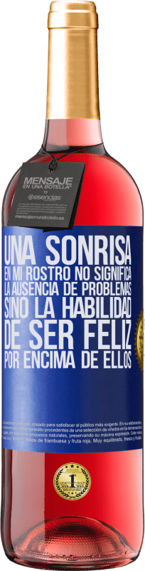 29,95 € Envío gratis | Vino Rosado Edición ROSÉ Una sonrisa en mi rostro no significa la ausencia de problemas, sino la habilidad de ser feliz por encima de ellos Etiqueta Azul. Etiqueta personalizable Vino joven Cosecha 2024 Tempranillo