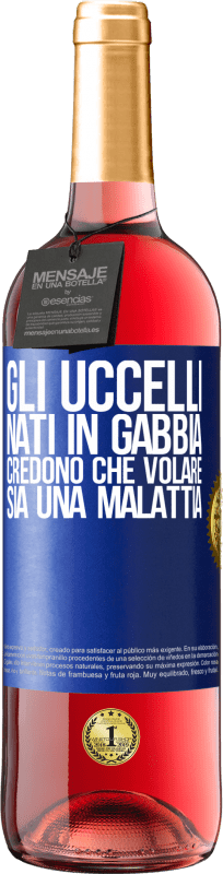 29,95 € Spedizione Gratuita | Vino rosato Edizione ROSÉ Gli uccelli nati in gabbia credono che volare sia una malattia Etichetta Blu. Etichetta personalizzabile Vino giovane Raccogliere 2024 Tempranillo