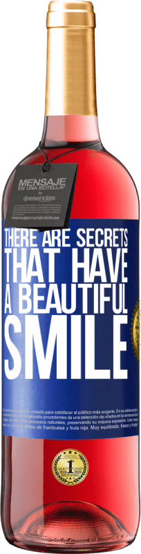 29,95 € 免费送货 | 桃红葡萄酒 ROSÉ版 有些秘密有美丽的笑容 蓝色标签. 可自定义的标签 青年酒 收成 2023 Tempranillo