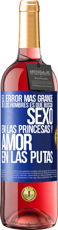 29,95 € Envío gratis | Vino Rosado Edición ROSÉ El error más grande de los hombres es que buscan sexo en las princesas y amor en las putas Etiqueta Azul. Etiqueta personalizable Vino joven Cosecha 2023 Tempranillo