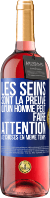 29,95 € Envoi gratuit | Vin rosé Édition ROSÉ Les seins sont la preuve qu'un homme peut faire attention à 2 choses en même temps Étiquette Bleue. Étiquette personnalisable Vin jeune Récolte 2023 Tempranillo