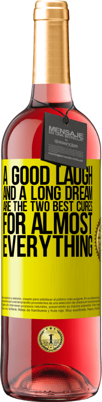 29,95 € Free Shipping | Rosé Wine ROSÉ Edition A good laugh and a long dream are the two best cures for almost everything Yellow Label. Customizable label Young wine Harvest 2023 Tempranillo