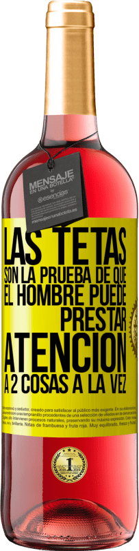 29,95 € Envío gratis | Vino Rosado Edición ROSÉ Las tetas son la prueba de que el hombre puede prestar atención a 2 cosas a la vez Etiqueta Amarilla. Etiqueta personalizable Vino joven Cosecha 2025 Tempranillo