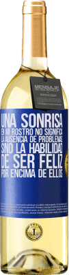 29,95 € Envío gratis | Vino Blanco Edición WHITE Una sonrisa en mi rostro no significa la ausencia de problemas, sino la habilidad de ser feliz por encima de ellos Etiqueta Azul. Etiqueta personalizable Vino joven Cosecha 2024 Verdejo