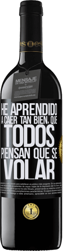 39,95 € Envío gratis | Vino Tinto Edición RED MBE Reserva He aprendido a caer tan bien, que todos piensan que sé volar Etiqueta Negra. Etiqueta personalizable Reserva 12 Meses Cosecha 2015 Tempranillo