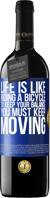 39,95 € 免费送货 | 红酒 RED版 MBE 预订 生活就像骑自行车。为了保持平衡，您必须继续前进 蓝色标签. 可自定义的标签 预订 12 个月 收成 2014 Tempranillo