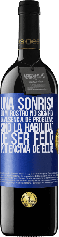 39,95 € Envío gratis | Vino Tinto Edición RED MBE Reserva Una sonrisa en mi rostro no significa la ausencia de problemas, sino la habilidad de ser feliz por encima de ellos Etiqueta Azul. Etiqueta personalizable Reserva 12 Meses Cosecha 2016 Tempranillo