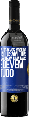 39,95 € Envio grátis | Vinho tinto Edição RED MBE Reserva Os escravos modernos não usam tiras. Eles usam uma marca e devem tudo Etiqueta Azul. Etiqueta personalizável Reserva 12 Meses Colheita 2015 Tempranillo