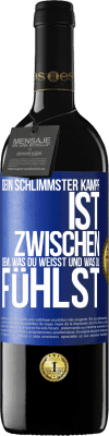 39,95 € Kostenloser Versand | Rotwein RED Ausgabe MBE Reserve Dein schlimmster Kampf ist zwischen dem, was du weißt und was du fühlst Blaue Markierung. Anpassbares Etikett Reserve 12 Monate Ernte 2014 Tempranillo