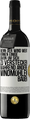 39,95 € Kostenloser Versand | Rotwein RED Ausgabe MBE Reserve Wenn der Wind weht, rennen einige davon, um sich zu verstecken, während andere Windmühlen bauen Weißes Etikett. Anpassbares Etikett Reserve 12 Monate Ernte 2016 Tempranillo