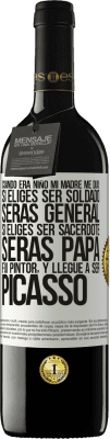 39,95 € Envío gratis | Vino Tinto Edición RED MBE Reserva Cuando era niño mi madre me dijo: si eliges ser soldado, serás general si eliges ser sacerdote, serás Papa. Fui pintor, y Etiqueta Blanca. Etiqueta personalizable Reserva 12 Meses Cosecha 2014 Tempranillo