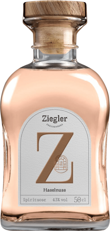 91,95 € Envio grátis | Aguardente Orujo Ziegler Alemanha Garrafa Medium 50 cl Haselnuss — Avelã
