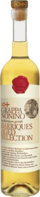 38,95 € Envio grátis | Aguardente Grappa Nonino Barriques Aged Selection Invecchiata in Barriques D.O.C. Friuli Friuli-Venezia Giulia Itália Garrafa Medium 50 cl