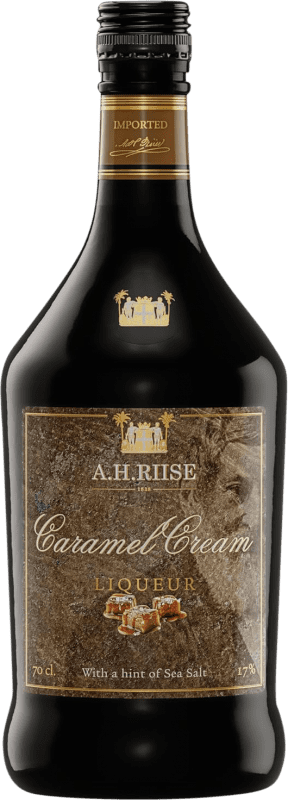 29,95 € Envío gratis | Crema de Licor A.H. Riise Caramel Dinamarca Botella 70 cl