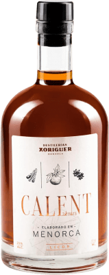 24,95 € Envío gratis | Licores Xoriguer Gin Calent Canela Azafrán España Botella 70 cl