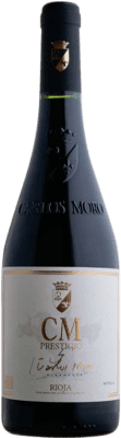 31,95 € Spedizione Gratuita | Vino rosso Carlos Moro Prestigio Crianza D.O.Ca. Rioja La Rioja Spagna Tempranillo Bottiglia 75 cl