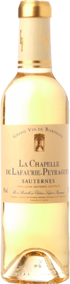 19,95 € Spedizione Gratuita | Vino Dolce Château Lafaurie-Peyraguey La Chapelle A.O.C. Sauternes bordò Francia Sémillon, Muscadelle, Sauvignon Mezza Bottiglia 37 cl