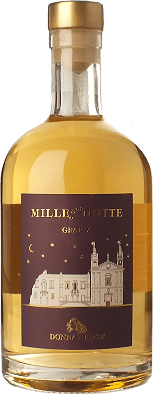71,95 € Envio grátis | Grappa Donnafugata Mille e Una Notte I.G.T. Grappa Siciliana Sicília Itália Garrafa Medium 50 cl