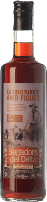 16,95 € Бесплатная доставка | Сливочный ликёр Segadors del Delta Каталония Испания 70 cl Arroz — Рис, Figues — Инжир