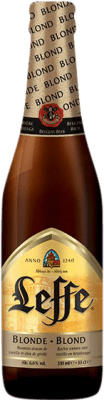72,95 € Бесплатная доставка | Коробка из 24 единиц Пиво Leffe Blonde треть литровая бутылка 33 cl