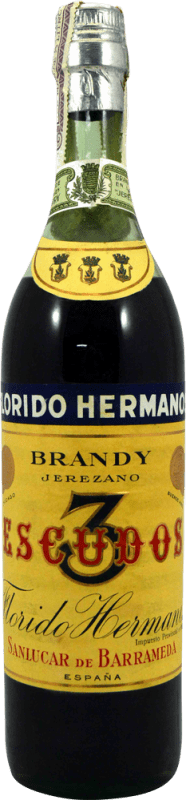 178,95 € Envio grátis | Brandy Conhaque Hermanos Florido 3 Escudos Espécime de Colecionador década de 1970 Espanha Garrafa 75 cl