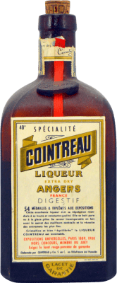 33,95 € Spedizione Gratuita | Liquori Cointreau Botella Desprecintada Esemplare da Collezione anni '70 Spagna Bottiglia 1 L