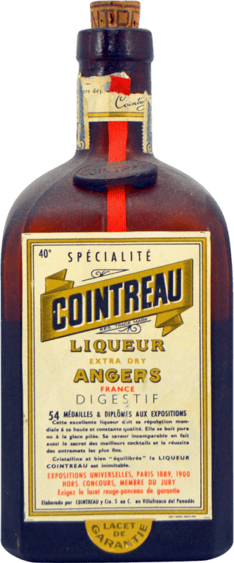 34,95 € 免费送货 | 利口酒 Cointreau Botella Desprecintada 1970's 西班牙 1 L 收藏品 不可食用 Orange — 橙子