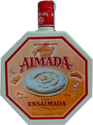 19,95 € Spedizione Gratuita | Crema di Liquore Campeny Aimada Licor de Ensaimada Spagna Bottiglia 70 cl